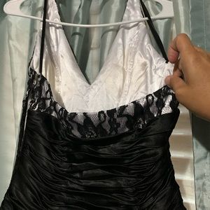 Size 7/8 halter top . Black and white ruffle dress